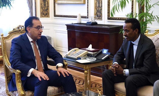 Egypt's Prime Minister Mostafa Madbouli (L) receives Somali Foreign Minister Ahmed Awad (R) – Egypt Today/Soliman al-Eteify